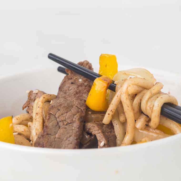 A serving of Blackstone steak udon ready to eat off the griddle