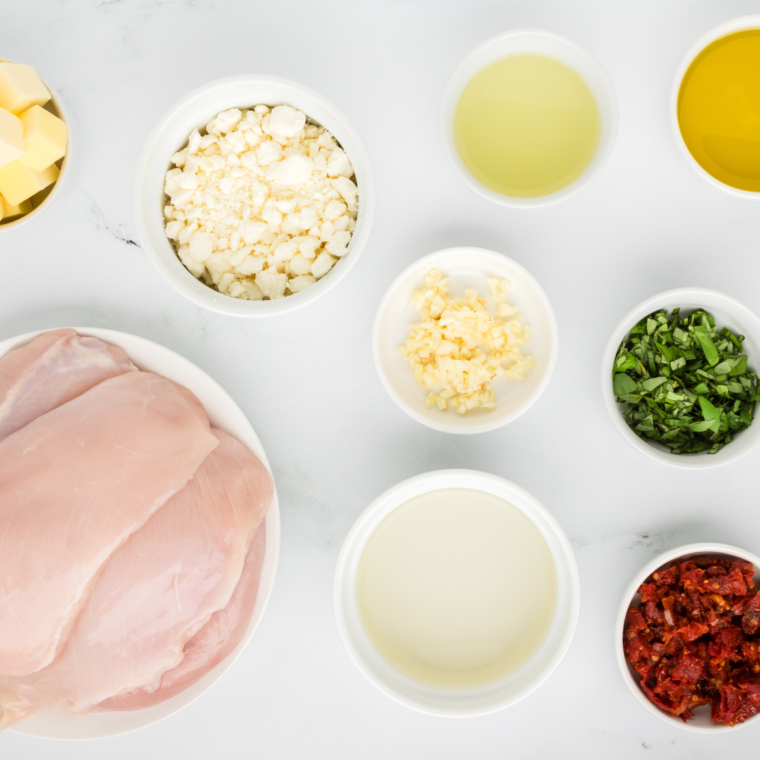 Ingredients Needed For Copycat Carrabba’s Chicken Bryan on kitchen table.