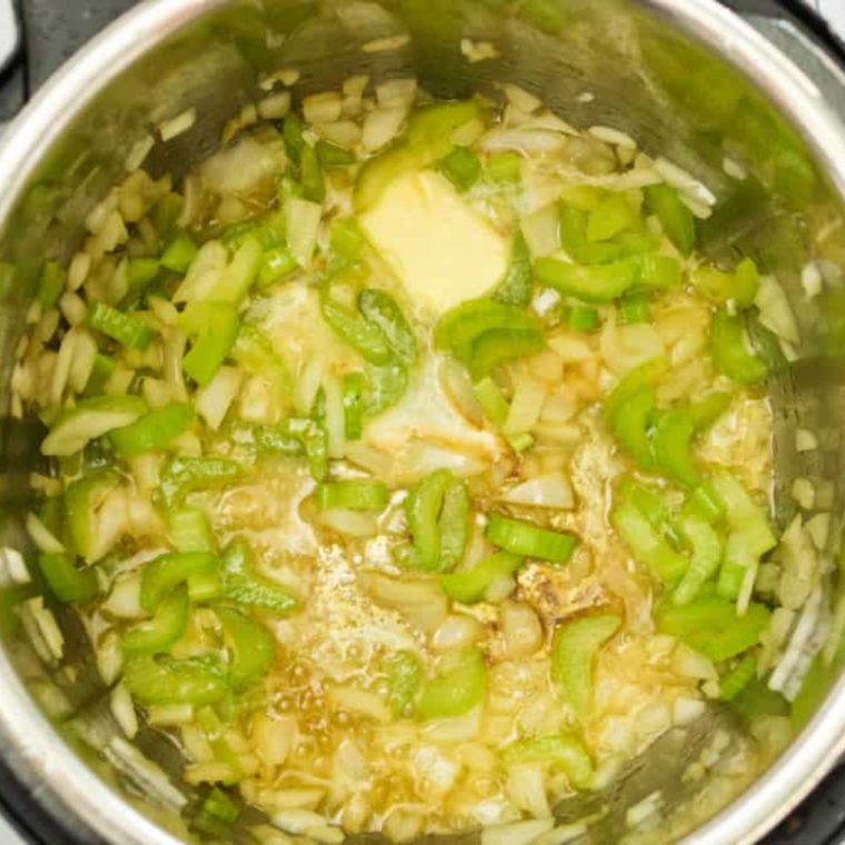 "Chicken and vegetables sautéing in the Instant Pot before adding broth and gnocchi."