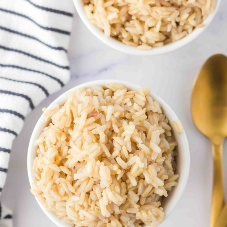 Fluffy brown rice cooked in the Ninja Foodi, ready to serve as a side dish.