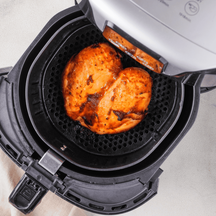 Air frying chicken bites until golden and crispy