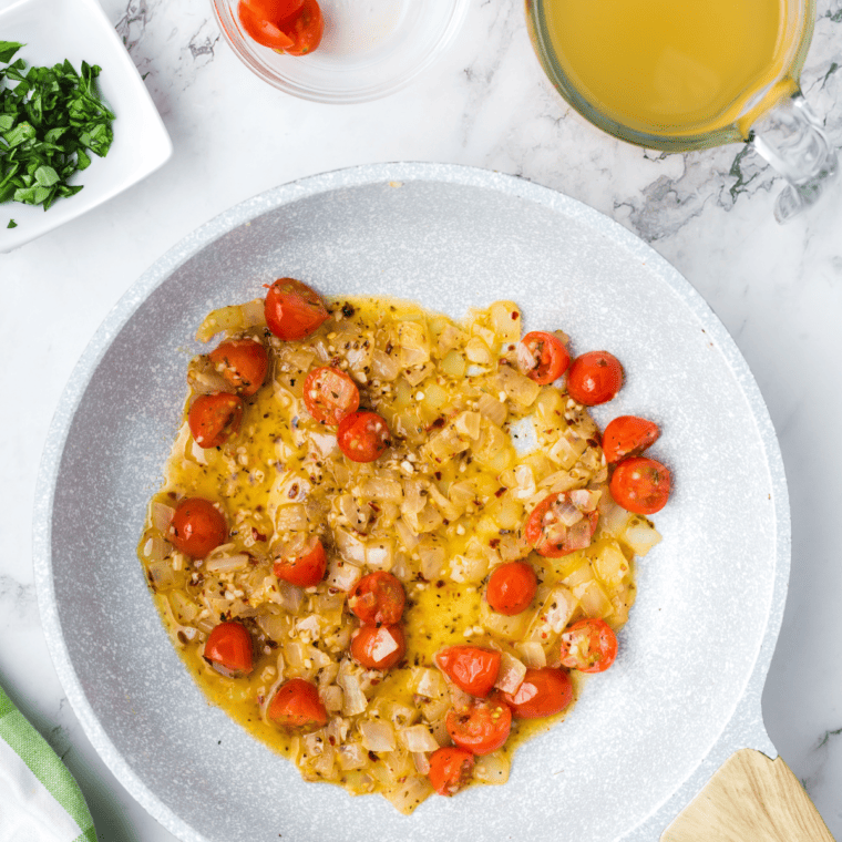 Sauting the sauce, for a creamy topping.