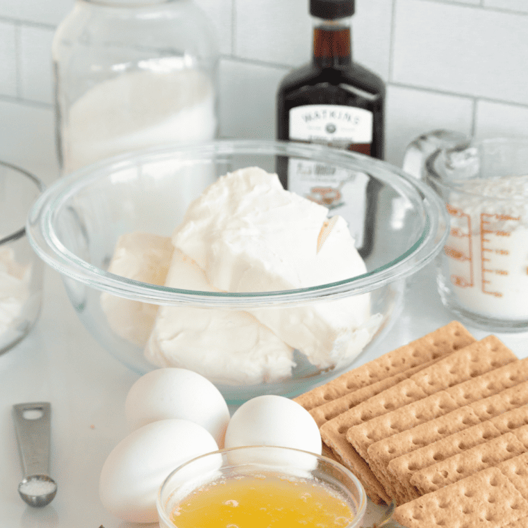 Air Fryer Strawberry Cheesecake Bars ingredients on a kitchen table.
