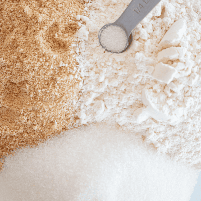 Mixing graham cracker crumbs with melted butter in a large bowl to prepare crust.
