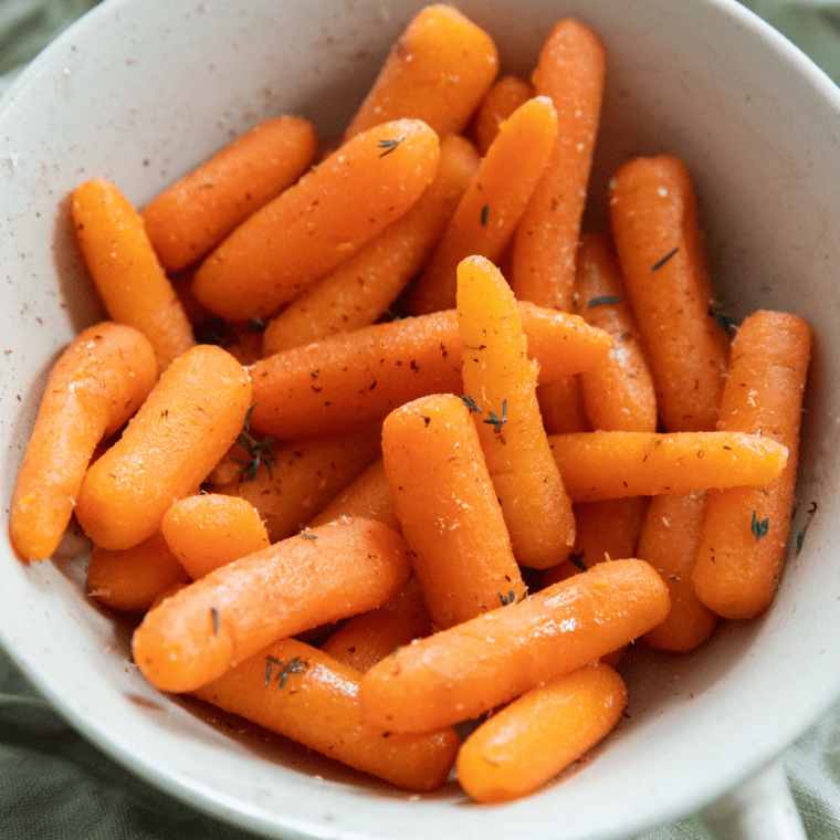 "Plate of finished Cracker Barrel Carrots with a sweet glaze"