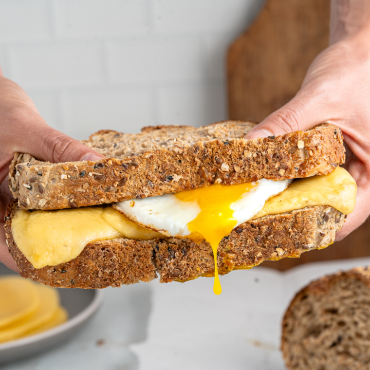 Air fryer breakfast grilled cheese sandwich with melted cheese and crispy bread