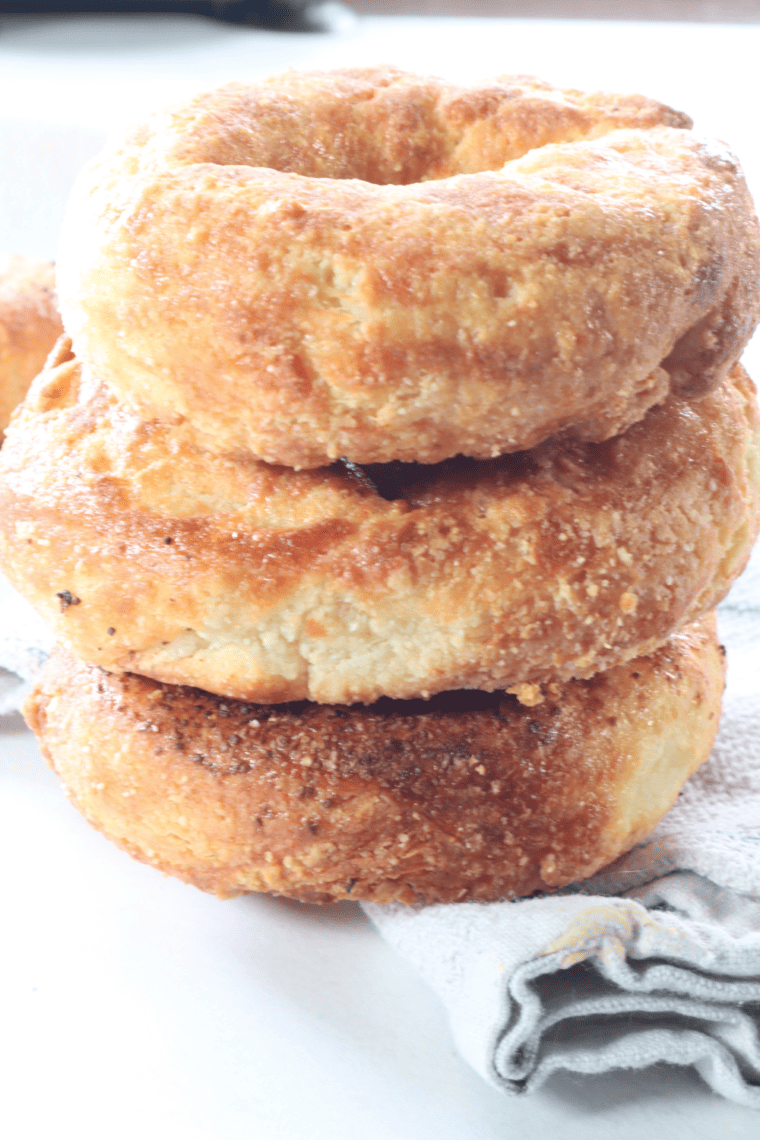 "Freshly baked Air Fryer Keto Bagels with a golden crust on a cooling rack"