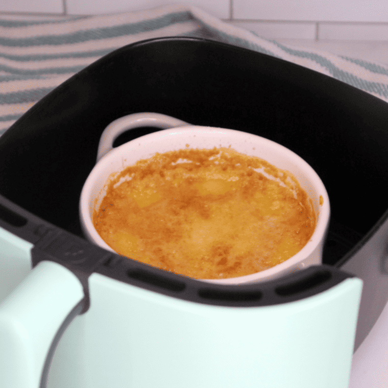 Close up of Air Fryer Lemon Dump Cake in air fryer basket.