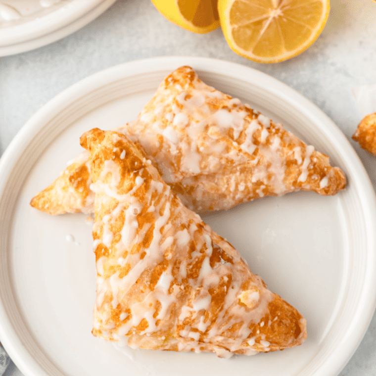 "Close-up of air fryer lemon turnovers filled with creamy lemon curd."