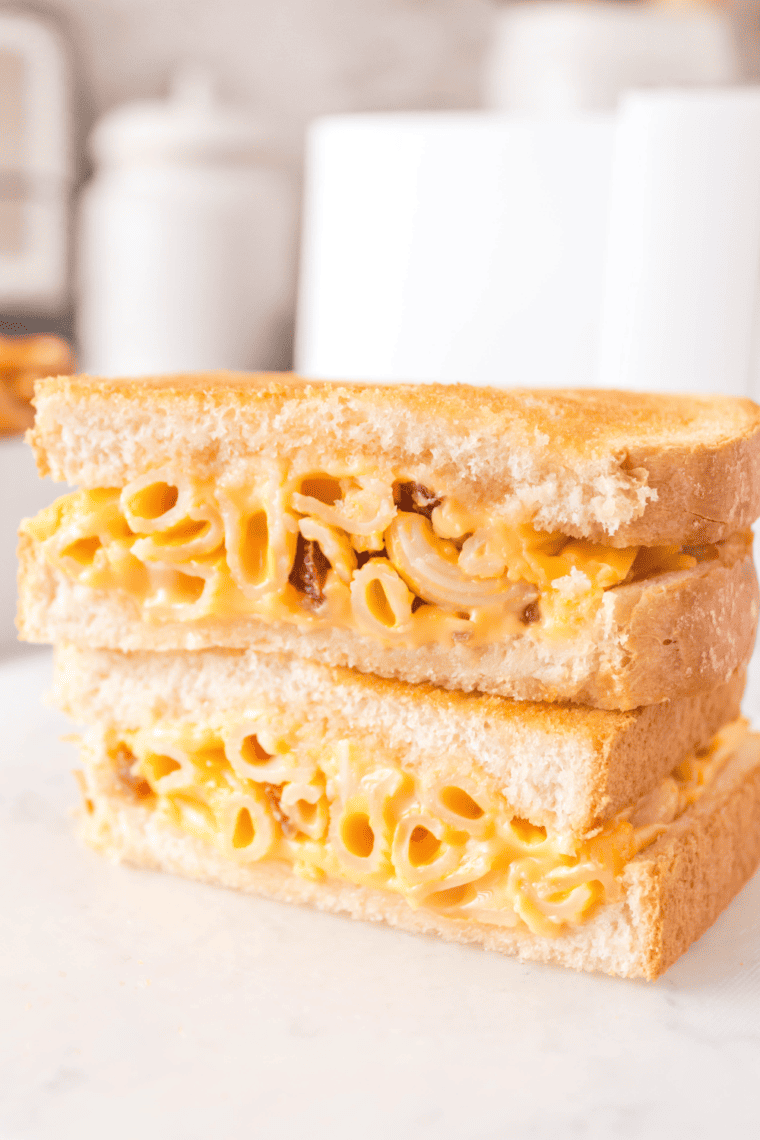 Ultimate indulgent Air Fryer Mac & Cheese Grilled Cheese with melted cheese"