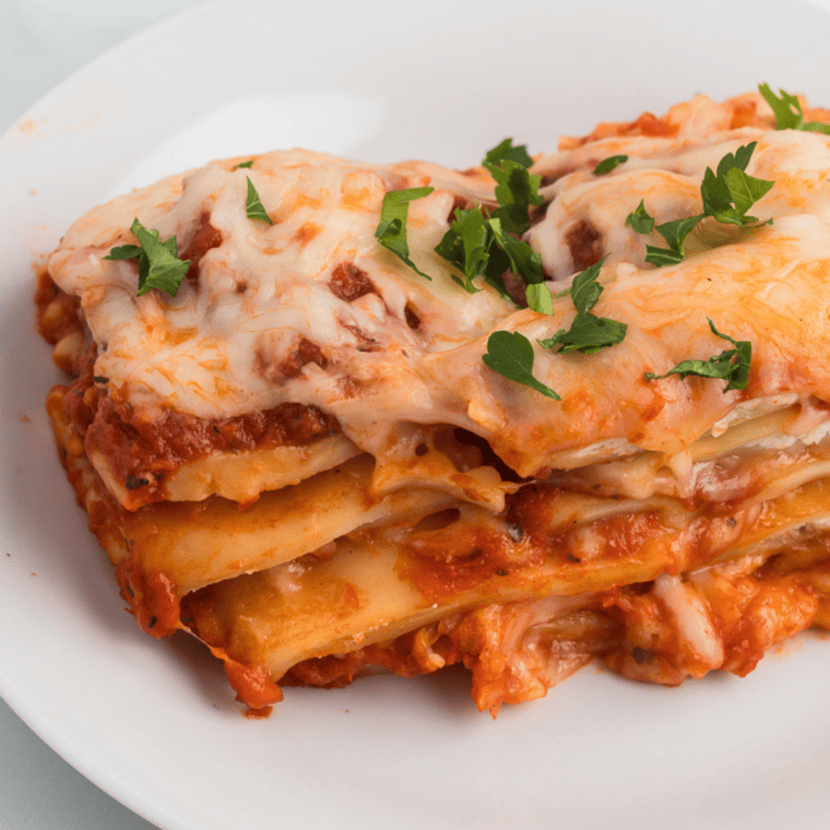 Crispy Air Fryer Ravioli Lasagna with layers of cheese and sauce.