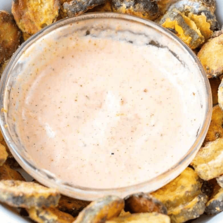 Finished fried pickle dipping sauce whisked smooth in a bowl