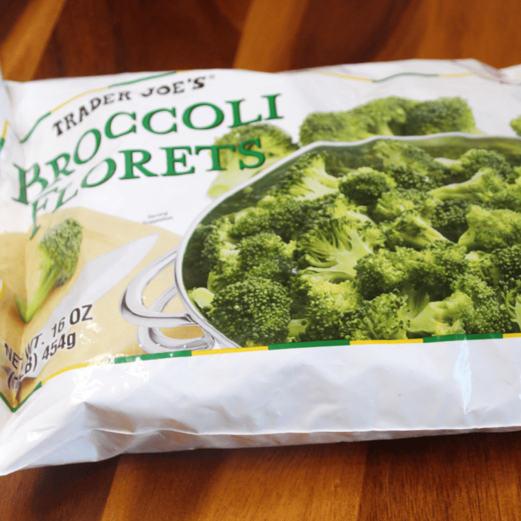 Trader Joe's Frozen Broccoli Florets on kitchen table.