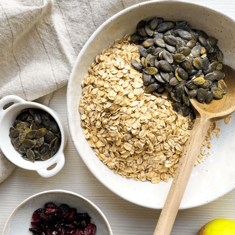 Vanilla granola ingredients in a large white bowl