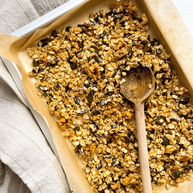 Spread Vanilla Granola mixture into a large baking pan lined with parchment paper.