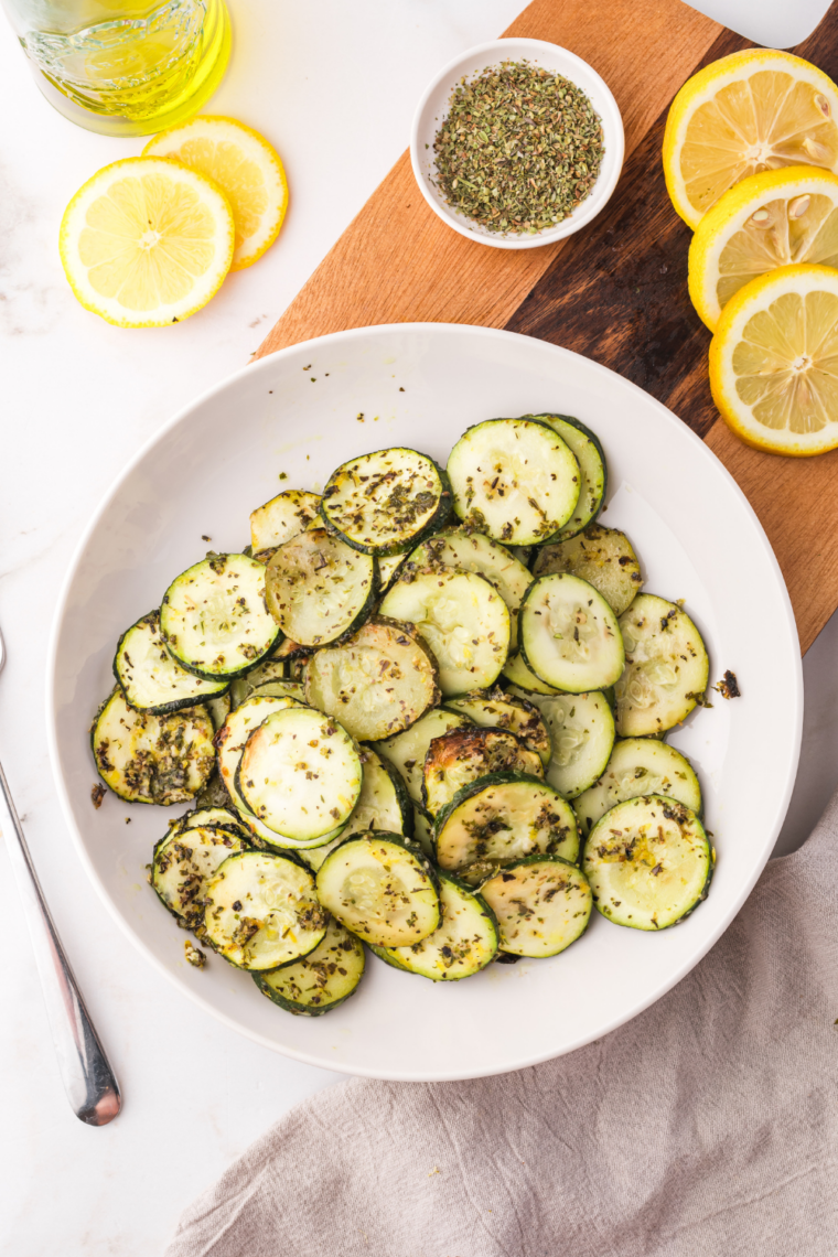 Blackstone zucchini sliced and cooked on griddle until lightly charred and tender in 8 minutes for easy healthy side dish