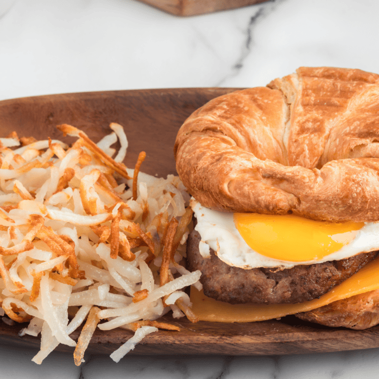 Burger King Sausage Egg and Cheese Croissan’wich on plate.