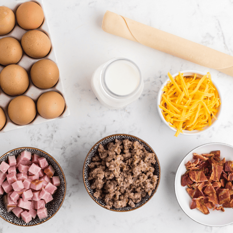 Ingredients Needed For Air Fryer Meat Lover's Quiche on kitchen table.