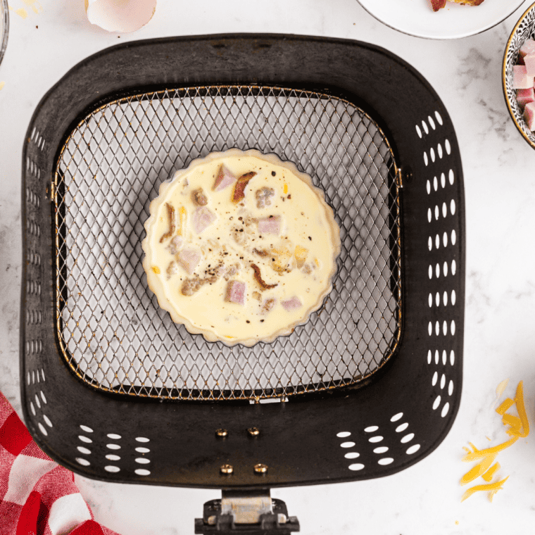 Place the filled pie crust into the air fryer basket.