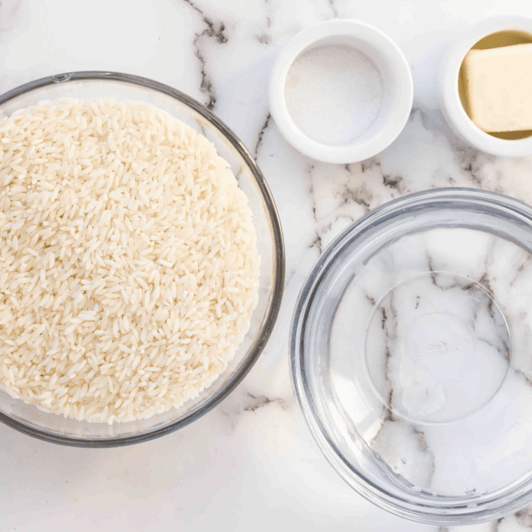 Ingredients needed for Ninja Foodi Basmati Rice on kitchen table.