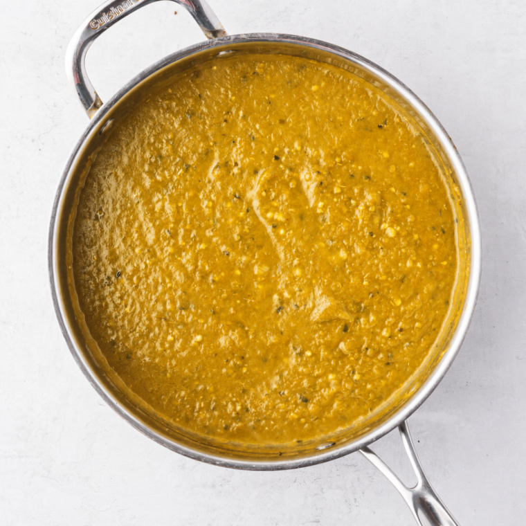 Carolina Gold BBQ sauce simmering and thickening in a saucepan