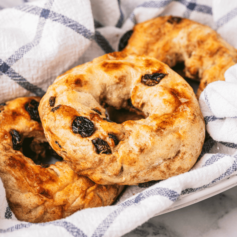 Freshly baked Air Fryer Cinnamon Raisin Bagels with a golden-brown crust"
