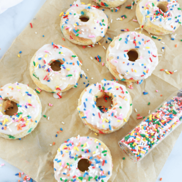 Glazed Air Fryer Funfetti cake mix donuts topped with rainbow sprinkles