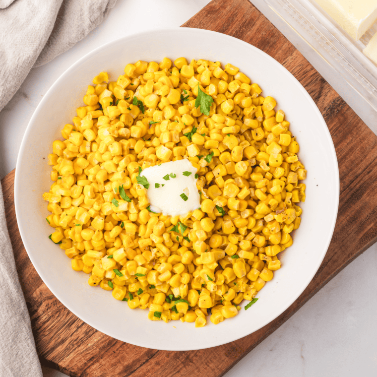 A bowl of crispy, golden air-fried canned corn seasoned to perfection.