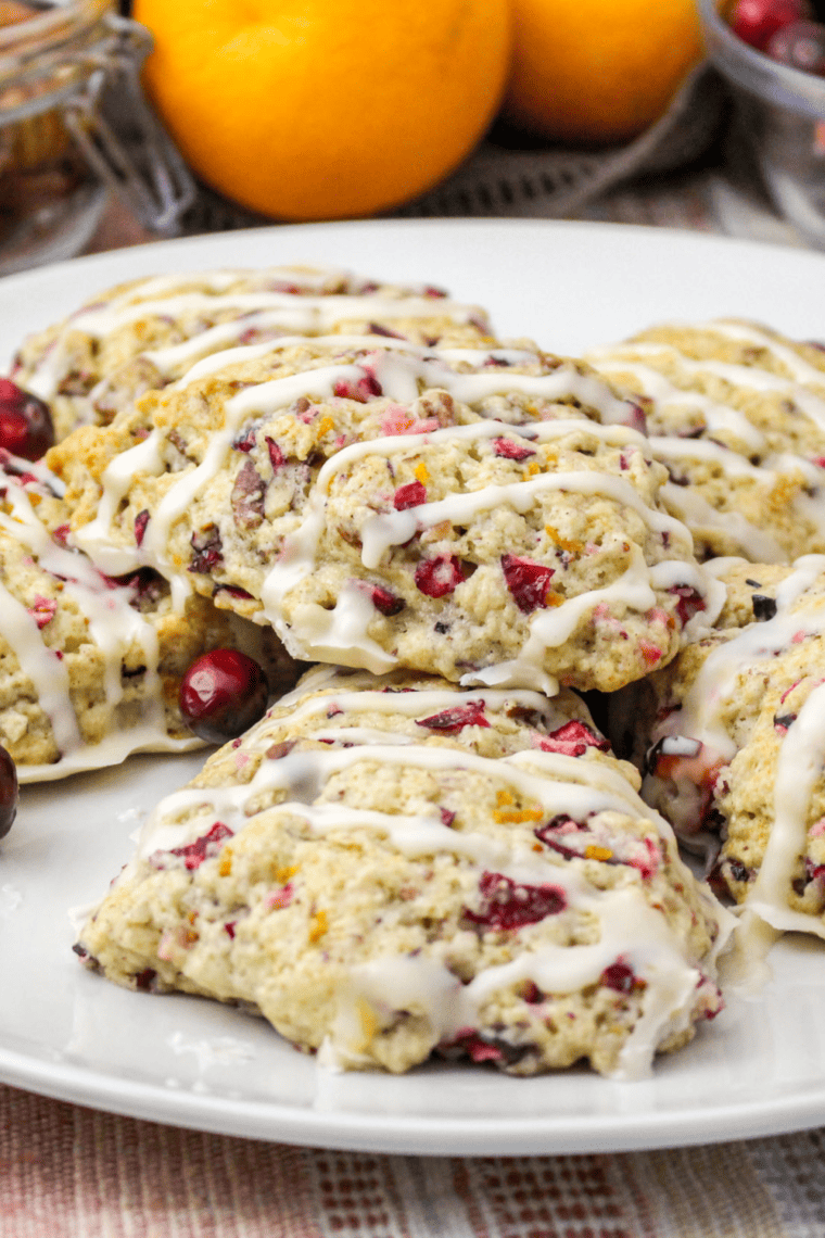 Air fryer cranberry orange scones with orange glaze.