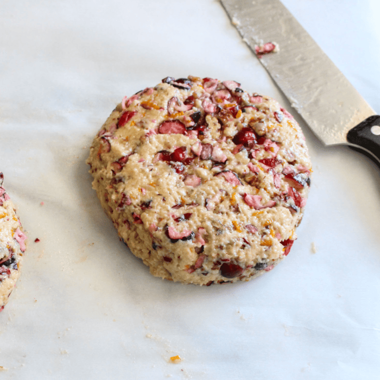 Scone dough patted into a circle and cut into six wedges