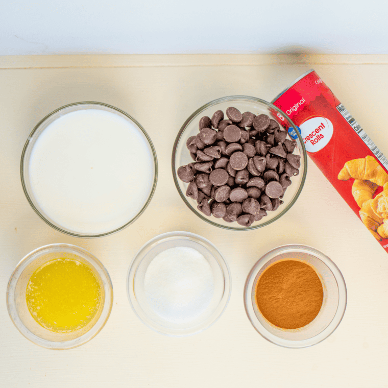 Ingredients for crescent churros: crescent roll dough, butter, sugar, and cinnamon