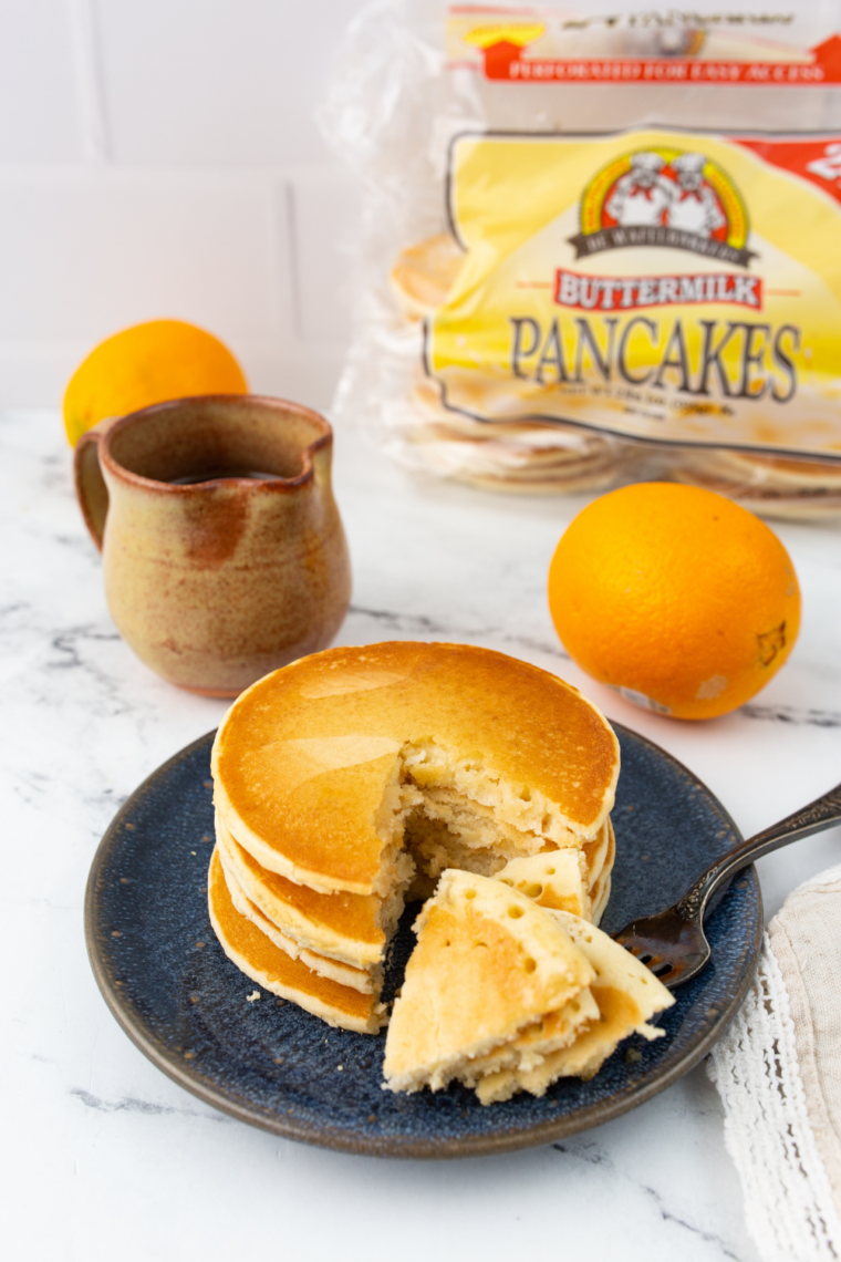 Frozen pancakes cooking in air fryer basket for quick breakfast