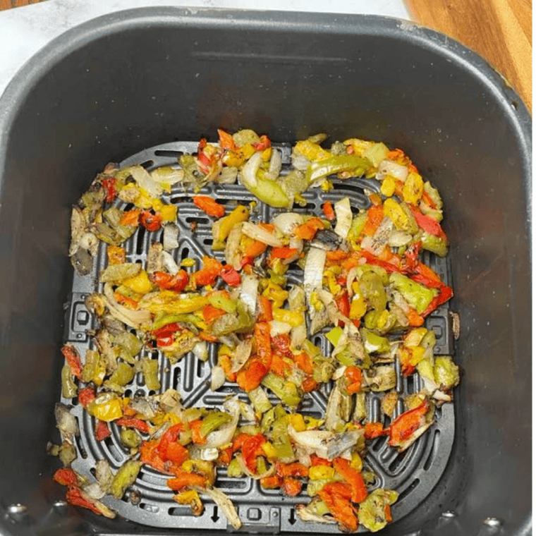 Air Fryer Frozen Peppers and Onions served as a colorful side dish.