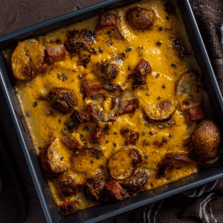 Casserole dish placed inside the air fryer basket before cooking