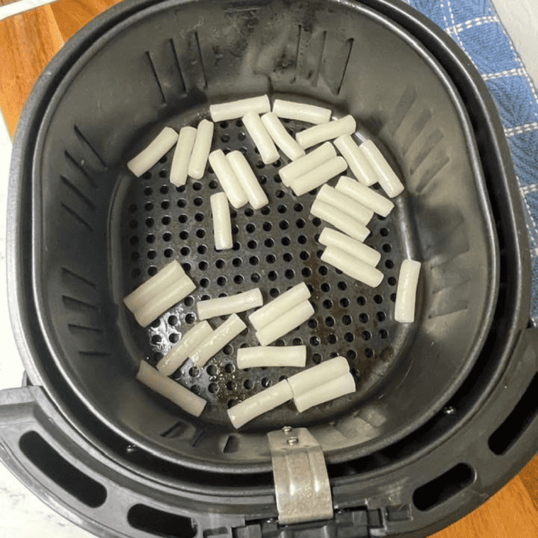 Place Rice Cakes into the air fryer basket.