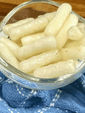 “Golden, crispy Air Fryer Rice Cakes served on a plate, ready to eat.”