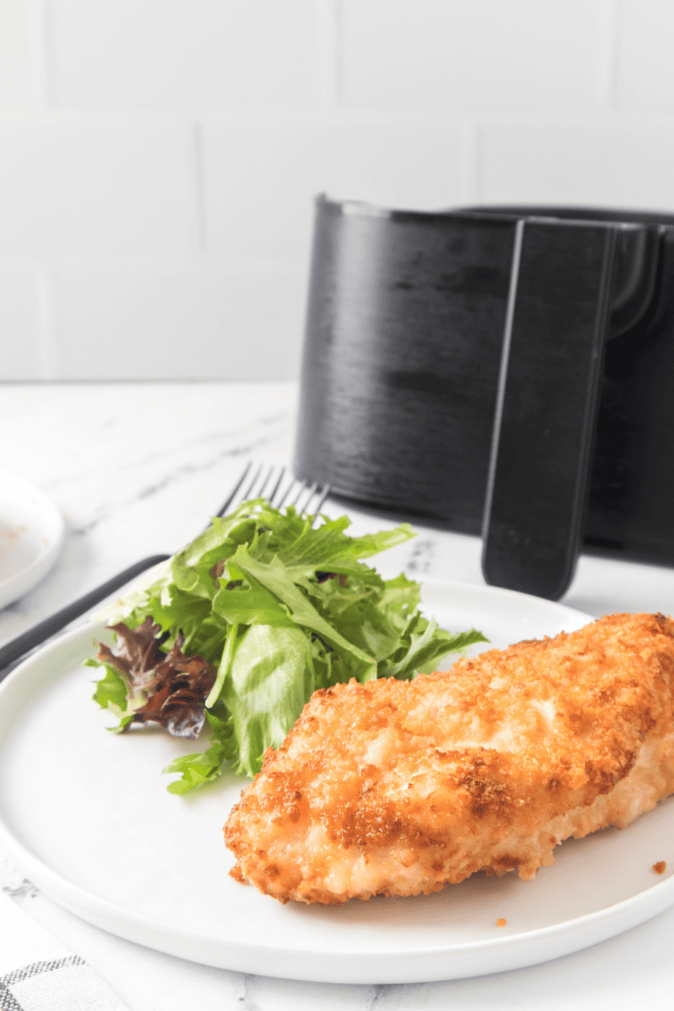 Delicious Air Fryer Ritz Cracker Chicken, perfectly breaded with crushed Ritz crackers, showcasing a crispy exterior and tender chicken inside, ready to serve.
