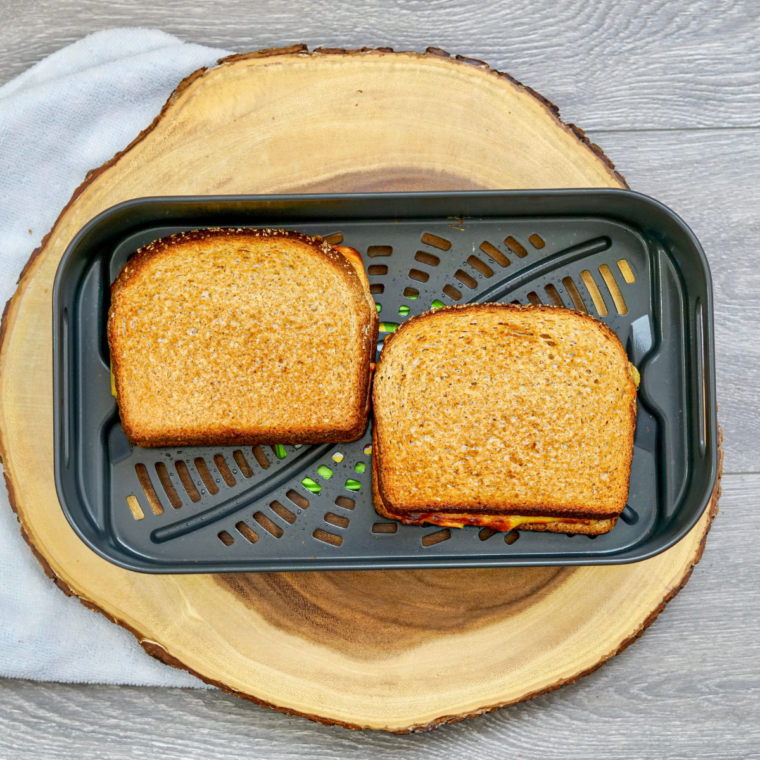 "Weight Watcher-friendly grilled cheese sandwich with a golden, crispy exterior."