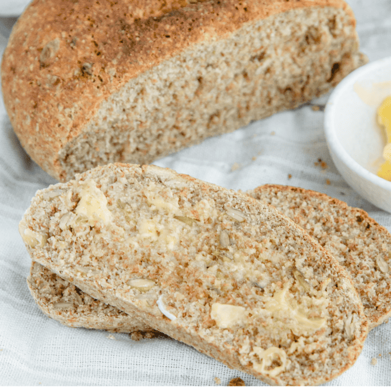 Air fryer whole wheat bread loaf with a golden crust and soft, fluffy interior