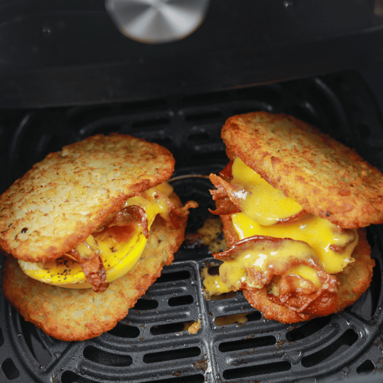 Air frying eggs at 300–330°F until whites are set and yolks reach desired doneness without opening basket