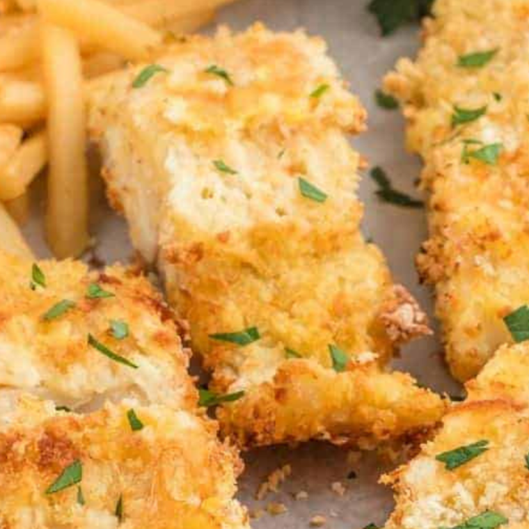 Crispy air fryer panko cod fillets served with lemon wedges and tartar sauce.