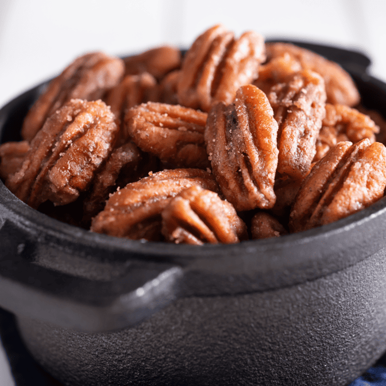 Roasted pecans in three flavors—sweet, salty, and spicy—freshly cooked in an air fryer and served in small bowls.