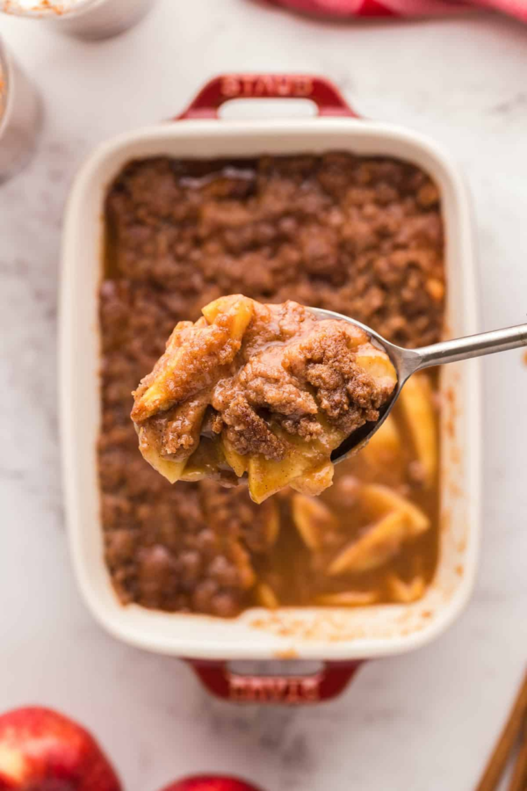 Golden almond-oat crumble over amaretto-spiced apples in a ramekin, made in the air fryer