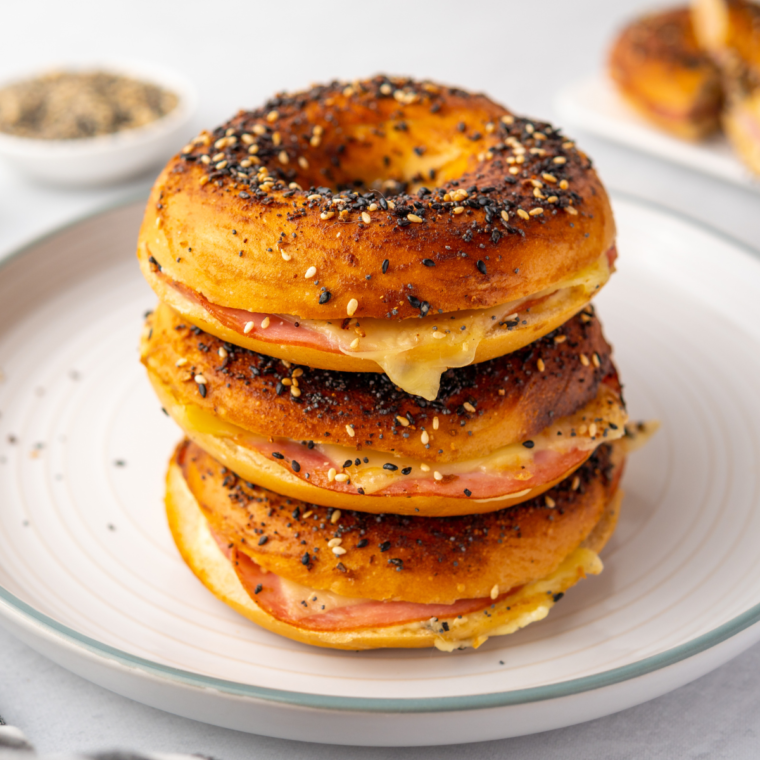 Air Fryer bagel breakfast sliders with crispy bagel halves, egg, cheese, and bacon