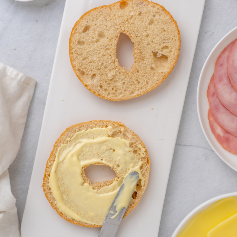 Toasting bagel halves in the air fryer to a crispy, golden-brown texture