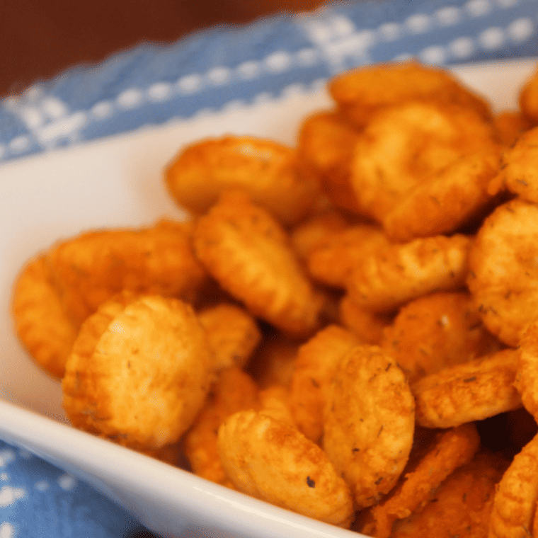 Crispy Air Fryer Buffalo Oyster Crackers coated in tangy buffalo seasoning.