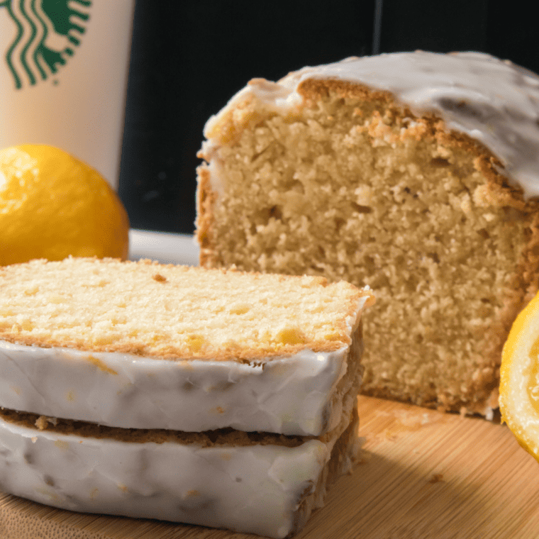 Air fryer copycat Starbucks iced lemon loaf with lemon glaze on a plate
