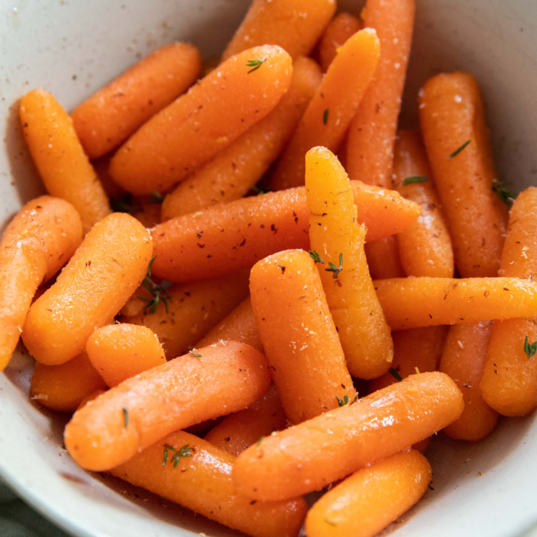 Air Fryer Ranch Carrots on Serving Dish - "Served Air Fryer Ranch Carrots on a decorative platter, ready for dinner."