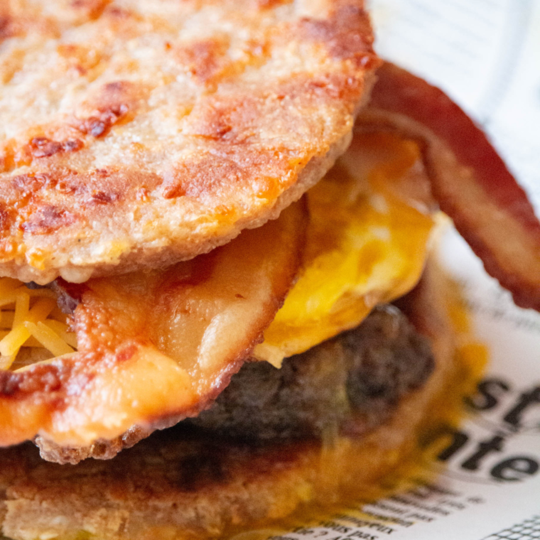 "Air Fryer Copycat Sausage McGriddle with fluffy pancakes, savory sausage, and melted cheese"