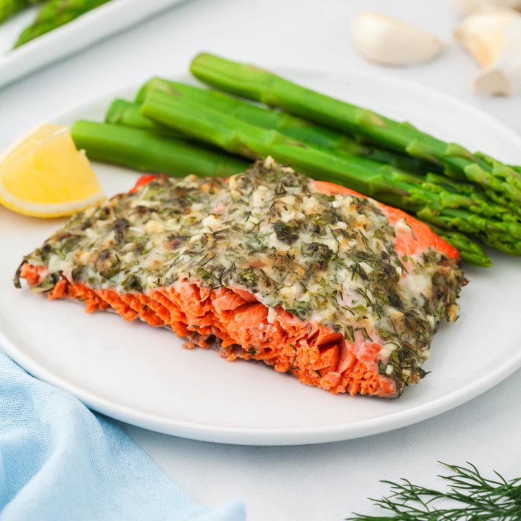 Bright red wild-caught sockeye salmon showing its flaky texture after air frying